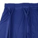 A royal blue Snap Drape table skirt with bow tie pleats.