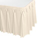 A bone colored Snap Drape table skirt with bow tie pleats.