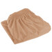 A folded Snap Drape sandalwood table skirt.