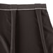 A charcoal table skirt with white continuous pleats and velcro clips.