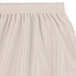 A silver cloud Snap Drape Wyndham table skirt with ruffles on the side.
