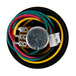 A round black container with several colored wires and a small motor with a variable speed knob.