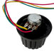 A round black container with colorful wires on a round black device.