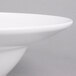 A white American Metalcraft melamine serving bowl with a white rim.