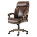 A brown leather Alera office chair with arms and wheels.