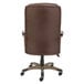 A brown leather Alera Veon Series office chair.