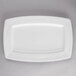 A white Libbey rectangular porcelain plate with curved edges.