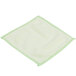 A green microfiber cloth with white trim.