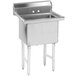 A stainless steel Advance Tabco one compartment pot sink on legs with a drain.