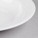 A Libbey Royal Rideau white porcelain soup bowl with a white rim.