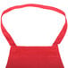 A red Chef Revival bib apron with red straps.