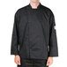 A man wearing a black Chef Revival long sleeve chef jacket with a mesh back.