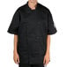 A person wearing a black Chef Revival short sleeve chef jacket with mesh back.