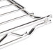 A close-up of a Metro Erecta chrome wire shelf with two metal bars.