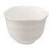 A Libbey Miyagi white stoneware sake cup with a gold speckled rim.