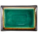 A green rectangular Libbey stoneware platter with brown specks on the border.