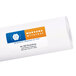 A roll of white Avery shipping labels with blue and orange print.