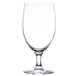A close-up of a clear Chef & Sommelier wine glass with a small base.