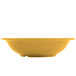 A yellow Thunder Group melamine soup bowl.