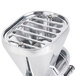 A close up of a stainless steel KitchenAid grain mill attachment.