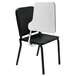 A black National Public Seating Melody stack chair with a white tablet desk arm.