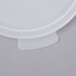 A white plastic lid on a white Cambro food storage container.