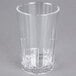 A Cambro clear polycarbonate tumbler with a straw in it.
