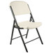 A Lifetime almond folding chair with black legs.