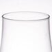 A close up of a Libbey stemmed pilsner glass with a white background.