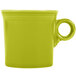 A lemongrass yellow Fiesta china mug with a handle.