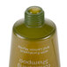 A close-up of a Basic Earth Botanicals Conditioning Shampoo bottle with a yellow label.