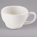 A Libbey ivory porcelain coffee cup with a handle.