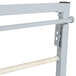 A metal frame with a metal bar and a wooden handle.