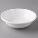 A Reserve by Libbey Aluma White porcelain oatmeal bowl on a gray surface.