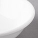 A close-up of a white Reserve by Libbey Aluma porcelain bowl.