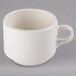 A Libbey ivory porcelain tea cup with a handle.