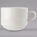 A white porcelain Libbey tea cup with a handle.
