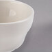A Libbey St. Francis ivory porcelain bouillon cup with a handle.