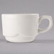 A Libbey ivory porcelain small stacking cup with a white handle.