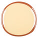 A Libbey terracotta plate with a brown rim on a white surface.