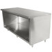 A stainless steel Advance Tabco cabinet base work table.