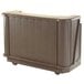 A brown Cambro portable bar with a granite sand counter on wheels.