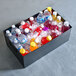 A black rectangular American Metalcraft beverage tub filled with bottles of water and ice.