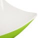 A close up of a green GET Keywest melamine bowl with a white rim.