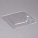 A clear plastic square plate with cup holder inserts.