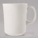 A Libbey ivory porcelain cafe mug with a white handle.