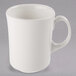 A Libbey ivory porcelain cafe mug with a handle.