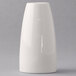 A white Libbey porcelain pepper shaker with a small cylindrical shape.