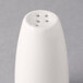 A white Libbey porcelain pepper shaker with holes in it.
