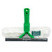 A green and white Unger Visa Versa window squeegee with a mop.